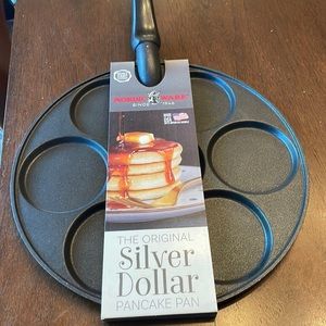 Nordic ware silver dollar pancake pan. In package.  Never used.